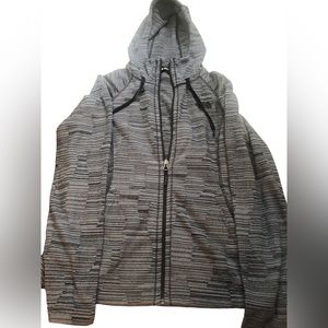 Northface Women’s hooded lightweight zippered jacket. Size M.